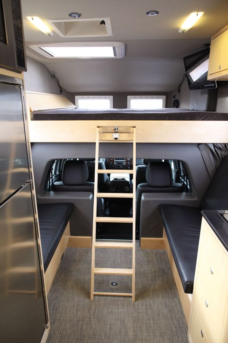 11 Brilliantly Creative Tiny Homes Made From Vehicles - Decor Hint Camper Van Loft