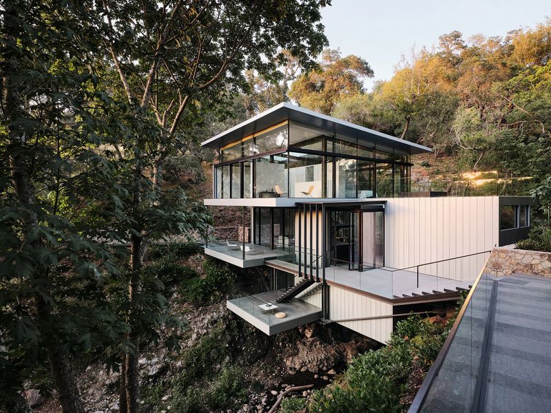 11 House Plans Nail Today's Aesthetic With Modern Design, Timeless Charm - Decor Hint Glass-Walled Pavilion