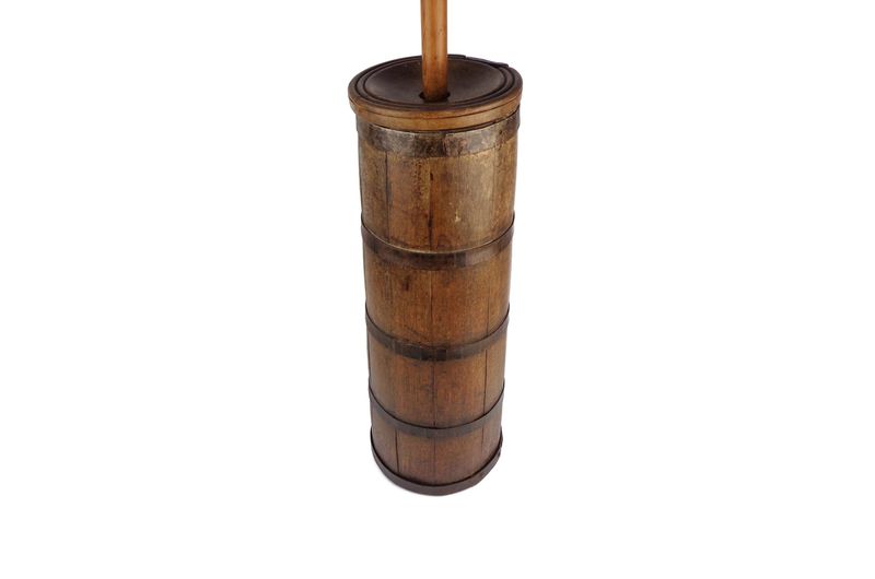 7 Antique Pieces That Elevate Any Southern Farmhouse Interior - Decor Hint Butter Churns as Decor