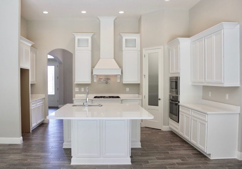 7 Kitchen Cabinet Styles Designers Recommend And 5 They Say To Avoid - Decor Hint Mismatched Cabinet Heights - Awkward Proportions