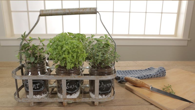 These 20 Garden Decor Ideas Are The Little Details That Will Make The Biggest Difference In Your Outdoor Space - Decor Hint Hanging Mason Jar Herb Garden
