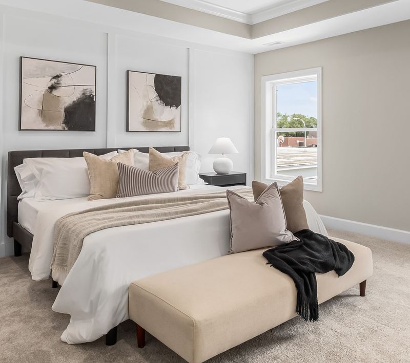 Beds Neatly Made with Throw Pillows