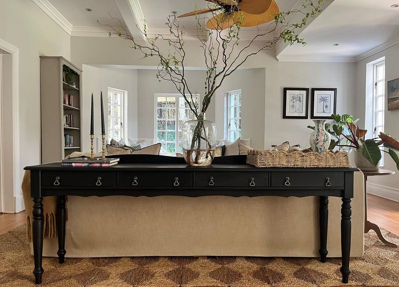 11 Furniture Items You Totally Do Not Need In Your Living Room - Decor Hint Fussy Console Tables Behind Sofas