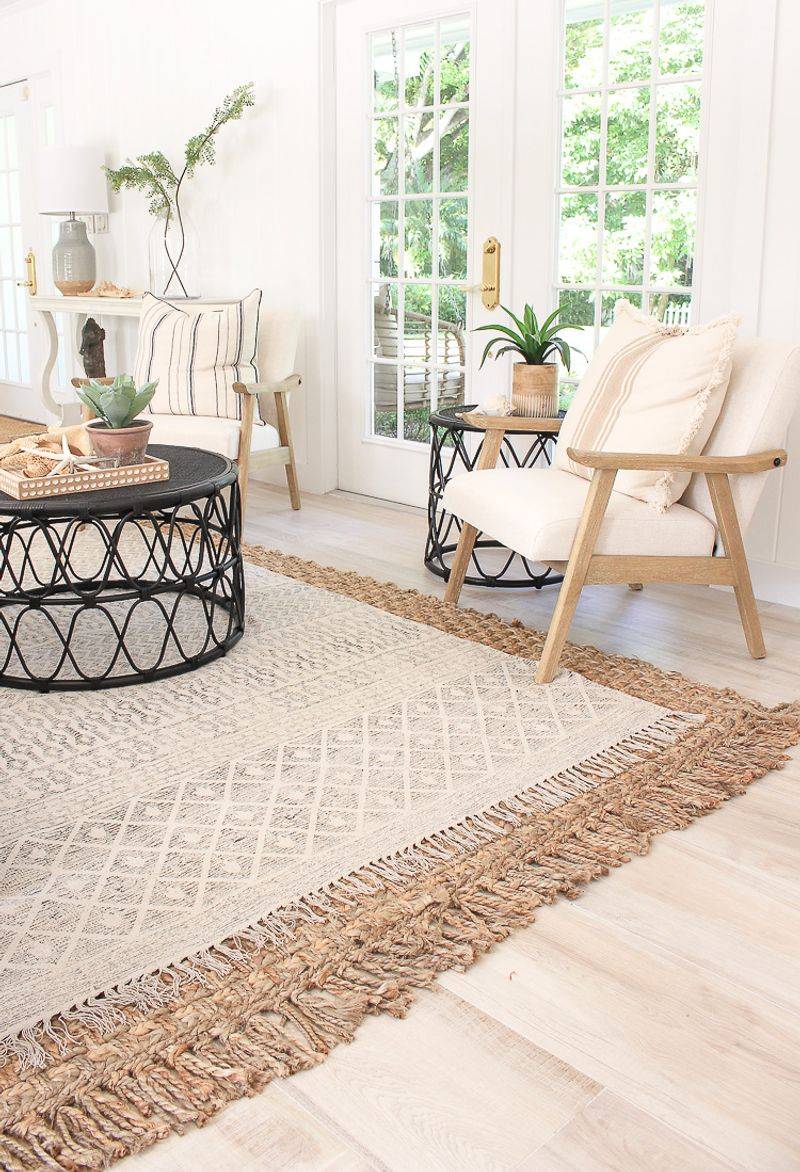 15 Functional And Stylish Farmhouse Living Room Ideas (Plus 5 You Will Absolutely Love) - Decor Hint Neutral layered rugs