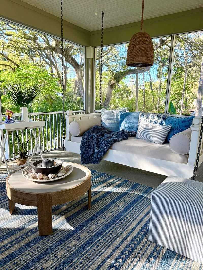24 Screened-In Porch Ideas That Will Make Your Home The Ultimate Retreat - Decor Hint Cozy Hanging Daybed