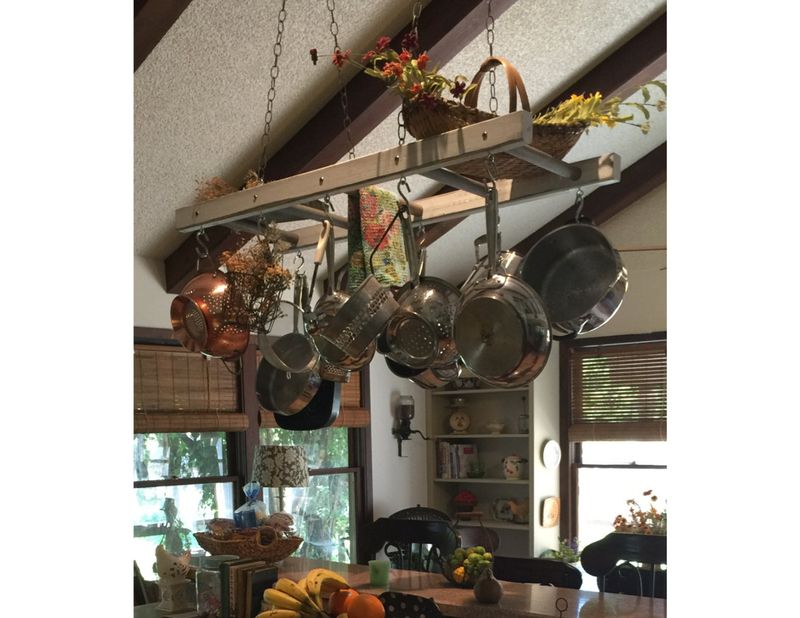 Small Yet Clever 10 Farmhouse Homes Show Off Brilliant Overhead Storage Ideas - Decor Hint Exposed Ceiling Beams with Hanging Pots