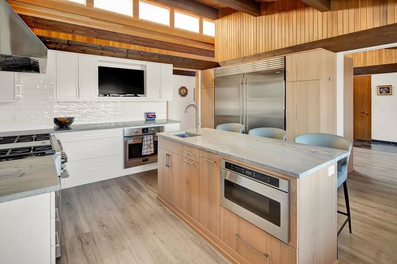 These 12 Kitchen Trends Are On Their Way Out (Plus 10 Timeless Looks To Stick With) - Decor Hint Microwave Over Range Placement Heating Up Criticism