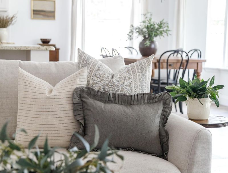 11 Sofa Styling Tricks For A Perfectly Put-Together Living Room - Decor Hint Play With Pillow Patterns