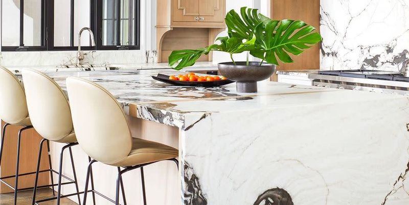 12 Impractical Kitchen Trends Interior Designers Say Won't Last In 2025 (Plus 7 Already Losing Their Momentum) - Decor Hint Waterfall Countertops That Break The Bank