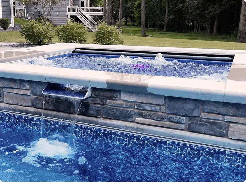 37 Stylish Poolside Designs That Make Everyday Feel Like Vacation - Decor Hint Integrated Hot Tub With Spillover Feature