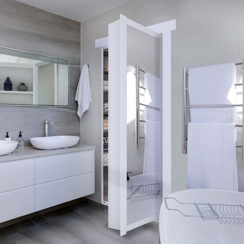16 Ways How Designers Use Hidden Doors: The Whimsical Trend That Can Actually Be Very Practical - Decor Hint Mirror Door in a Closet Entrance