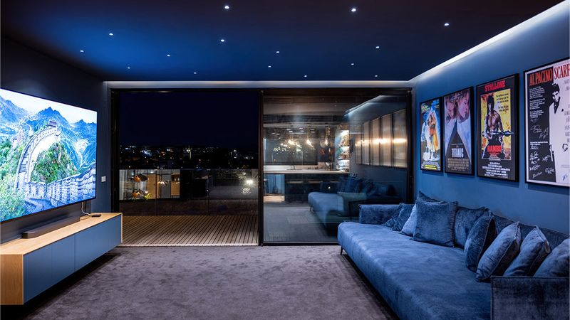 6 Smart Home Trends Shaping 2025 - Decor Hint Hyper-Personalized Multi-Sensory Entertainment Spaces
