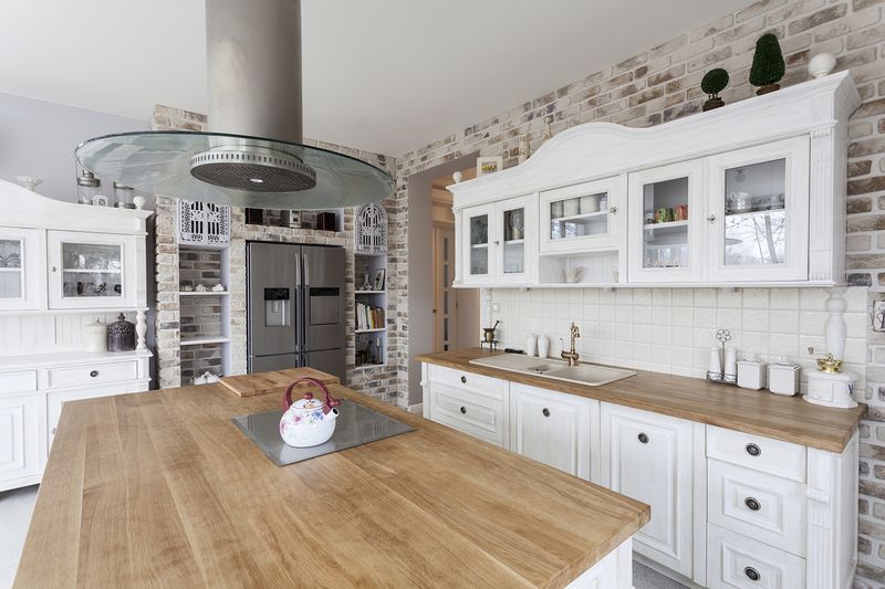 13 Timeless Design Trends Interior Experts Are Loving Again This Year - Decor Hint Butcher-Block or Natural Wood Countertops