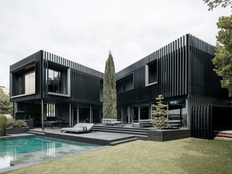 15 Black Homes That Break All The Rules - Decor Hint Geometric Shadow Play
