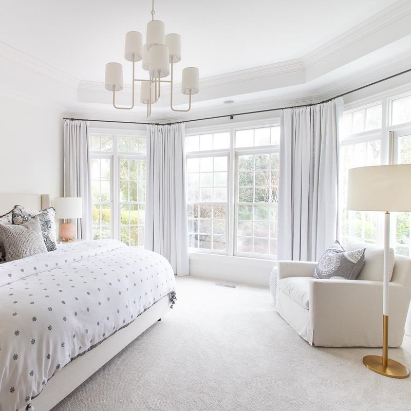 18 Most Useful Decorating Tips We've Ever Shared - Decor Hint Hang Curtains High and Wide