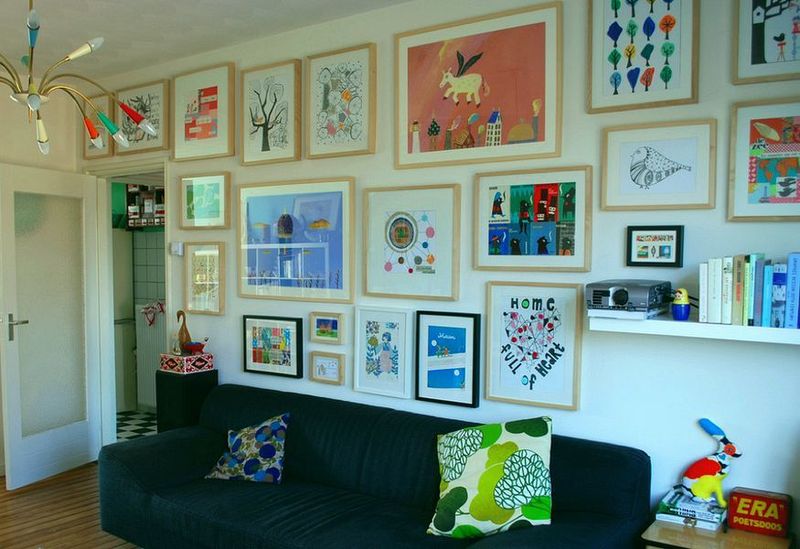 22 Home Offenses That Give Designers Instant Heartburn When They Walk Into Someone's Home - Decor Hint Excessive Wall Décor And Art Clutter