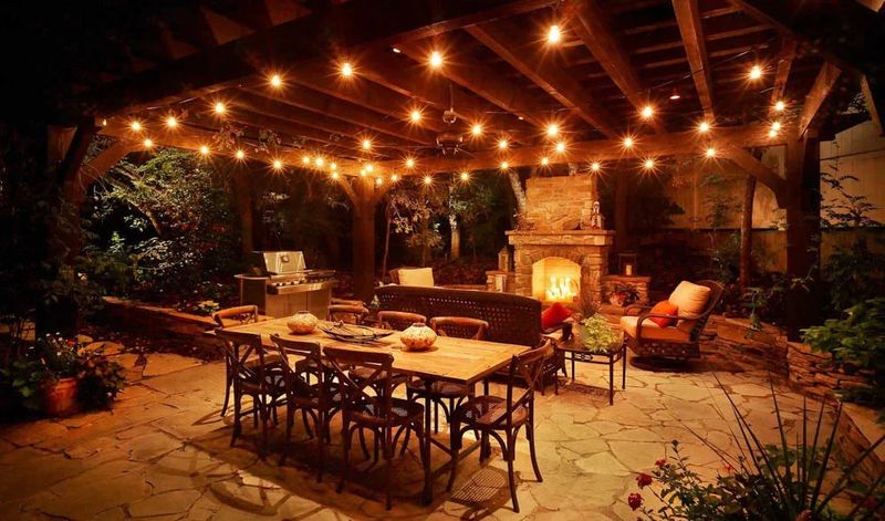 18 DIY Outdoor Decor Ideas That Look Way More Expensive Than They Are - Decor Hint String Light Canopy Using Basic Hooks and Wire