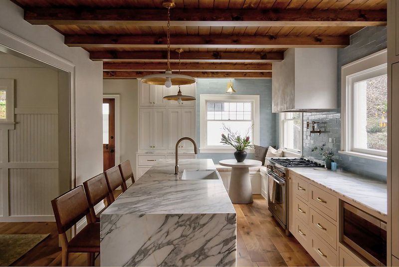 10 Earth-Toned Kitchens That Strike The Perfect Balance Between Modern & Timeless (Plus 10 That Are A Bad Choice) - Decor Hint Warm Gray Tones Mixed With Natural Wood Beams