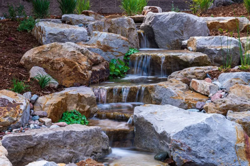 Want To Refresh Your Yard? Steal These Outdoor Decor Ideas From Colorado Homes - Decor Hint Boulder-Lined Water Features