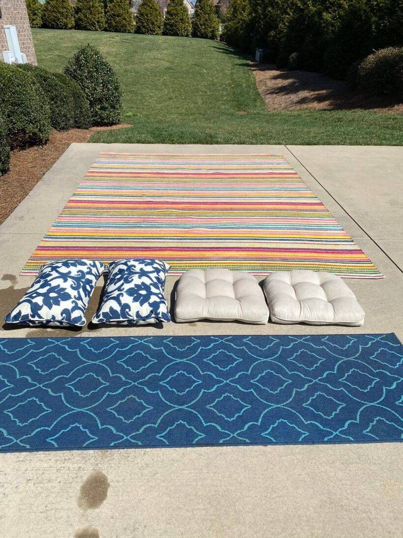 9 Items That Designers Say Should Never Be On Your Porch (And 8 That Should Be) - Decor Hint Dirty or Worn-Out Rugs