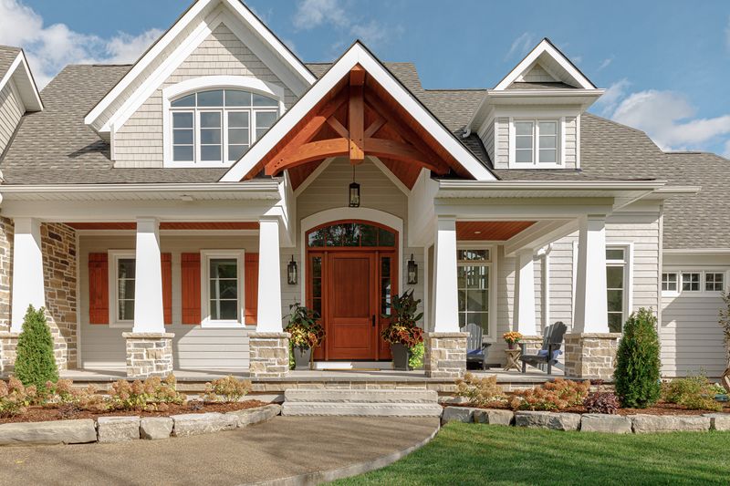 20 Modern Farmhouse Exterior Styles That Are Timeless - Decor Hint Stone and Shiplap Combination
