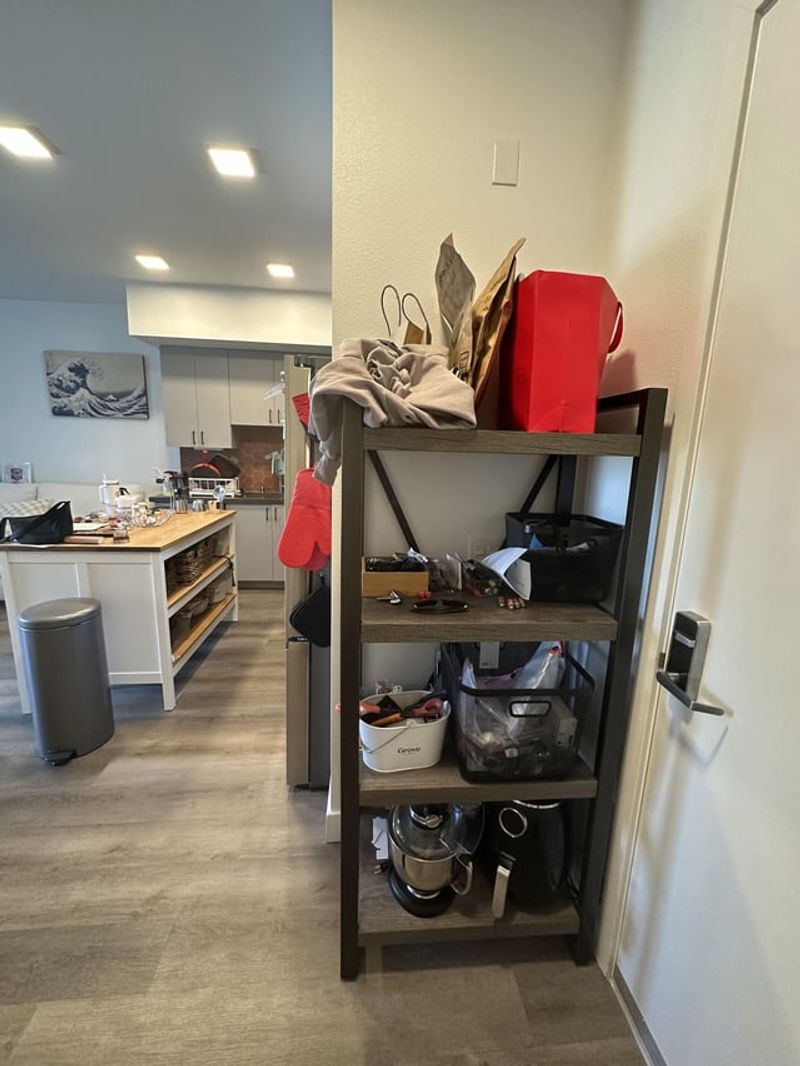 Open shelving with clutter