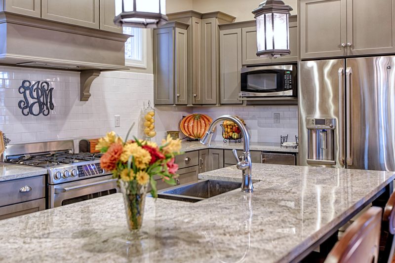 8 Kitchen Cabinet Looks Falling Out Of Style in Alabama And 5 Designers Still Love - Decor Hint Warm Gray Painted Cabinets