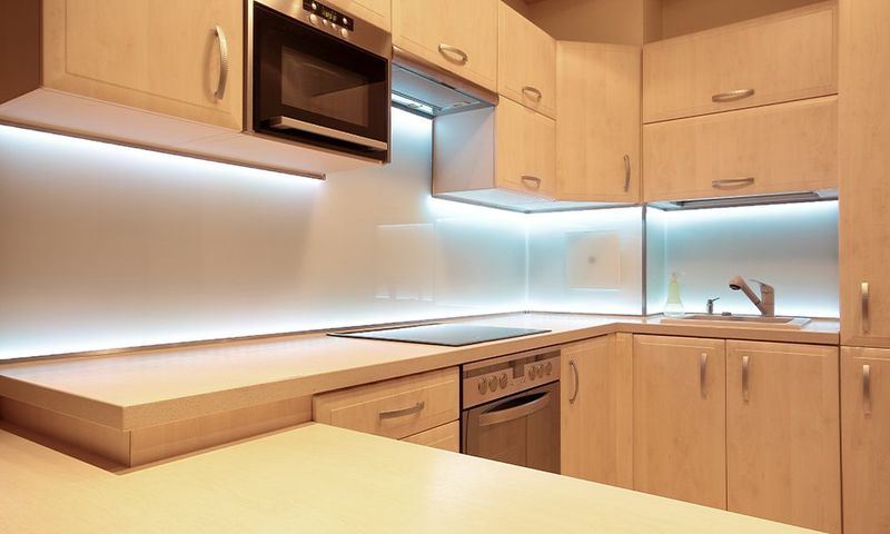 12 Inexpensive Ways To Makeover Your Kitchen, According To Designers - Decor Hint Install Under-Cabinet Lighting