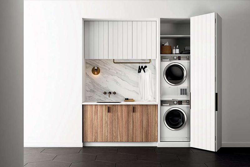 16 Tiny Room Layouts That Just Work - Decor Hint Stacked Washer/Dryer Hidden in Closet Space