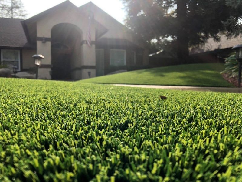 32 Housing Trends Experts Believe Could Hurt Home Values In 2025 - Decor Hint Synthetic Turf in Front Yards