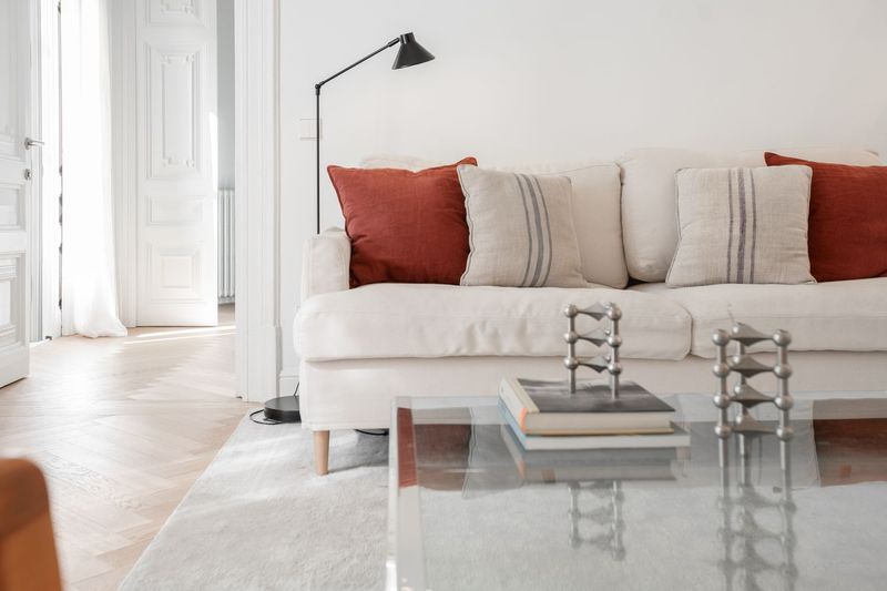 22 Living Room Features That Are Super Outdated, According To Designers - Decor Hint Excessive Throw Pillows