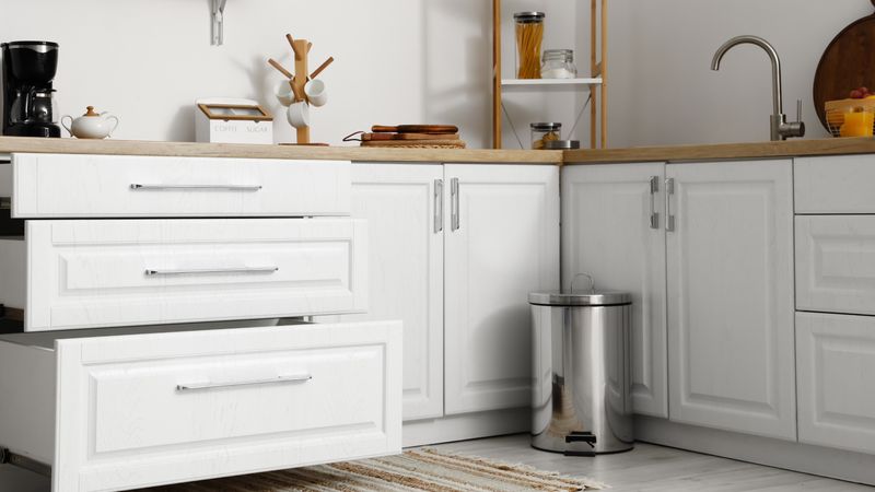 12 Invisible Mistakes Making Your Home Look Cluttered - Decor Hint Visible Trash Cans