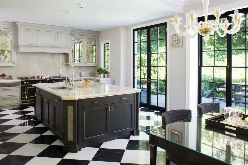 20 Outdated Kitchen Cabinet Styles Designers Say To Avoid - Decor Hint High-Contrast Black-and-White Combos (from early 2000s)