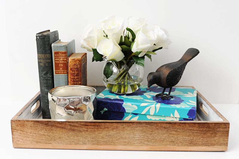19 Layering Techniques That Make Any Room Feel Professionally Styled - Decor Hint Place Trays to Corral Small Items
