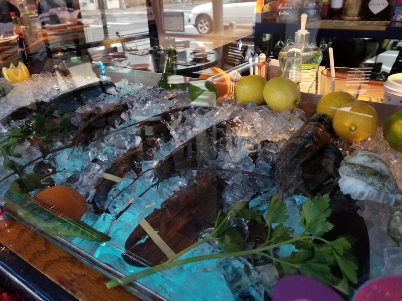 What makes the raw bar and daily catch stand out here