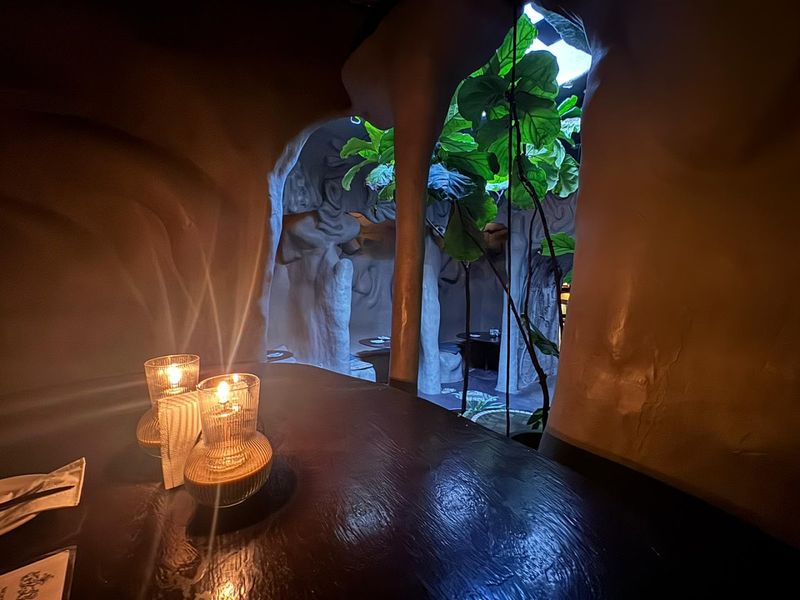 The Candlelit Cave Setting Is Worth The Trip Alone