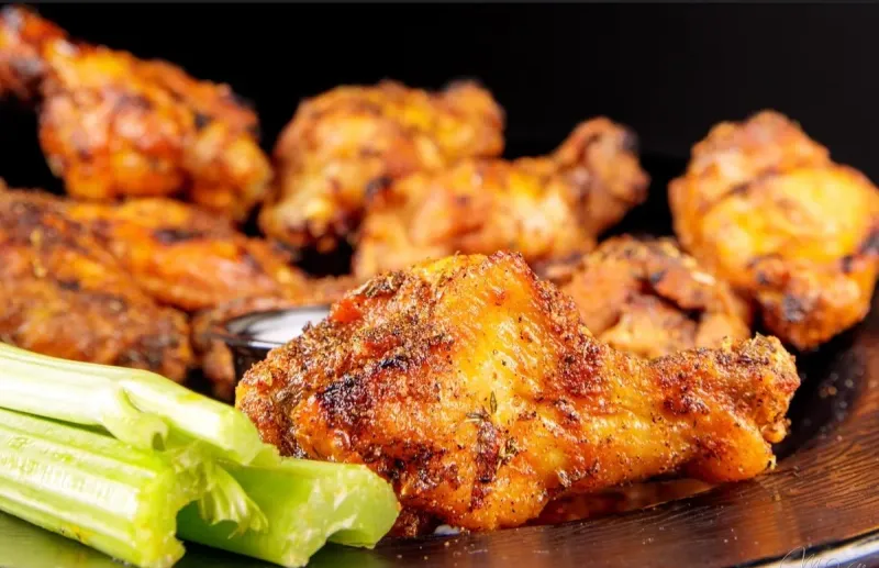 This Dania Beach Hotspot Serves Championship Wings With a Side of Tiki Bar Charm