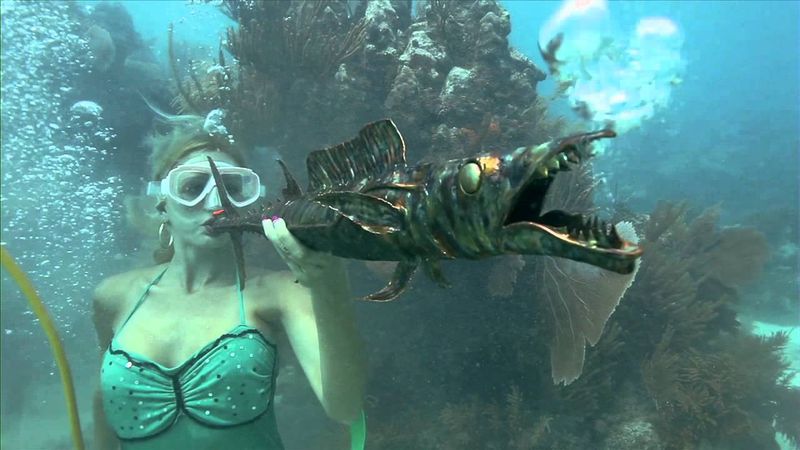 Whimsical Underwater Performers in Costume