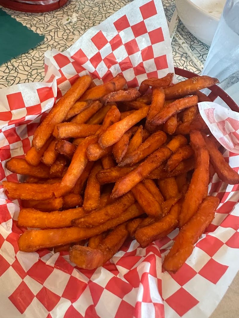 A Shareable Treasure In The French Fries And Onion Rings Combo