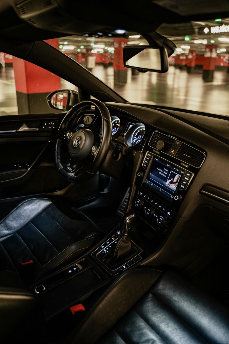 Car interiors with special finishes (dashboards, touchscreens, leather steering wheels)