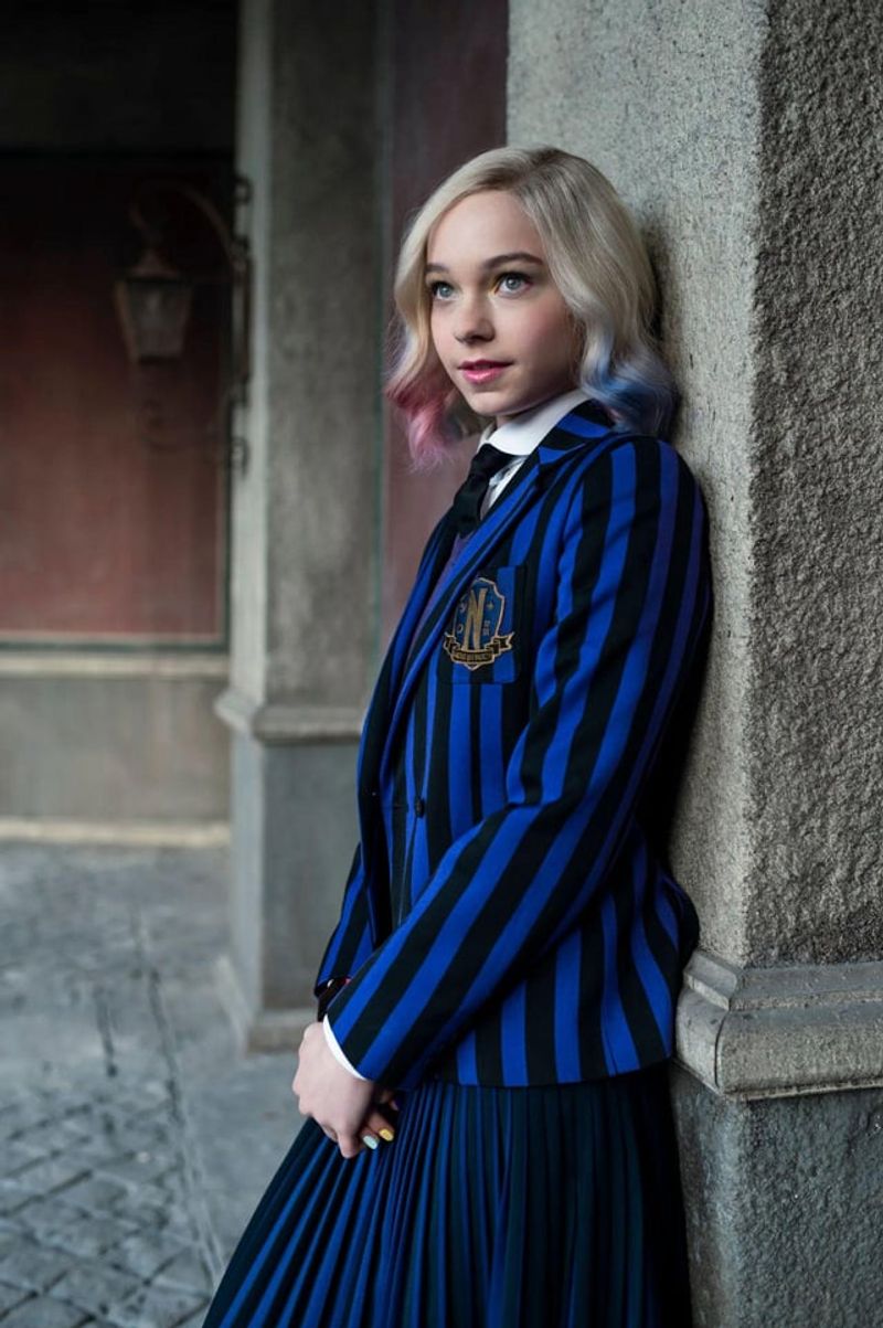 Emma Myers as Enid Sinclair