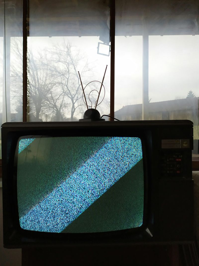 The Static Burst of a TV Turning On