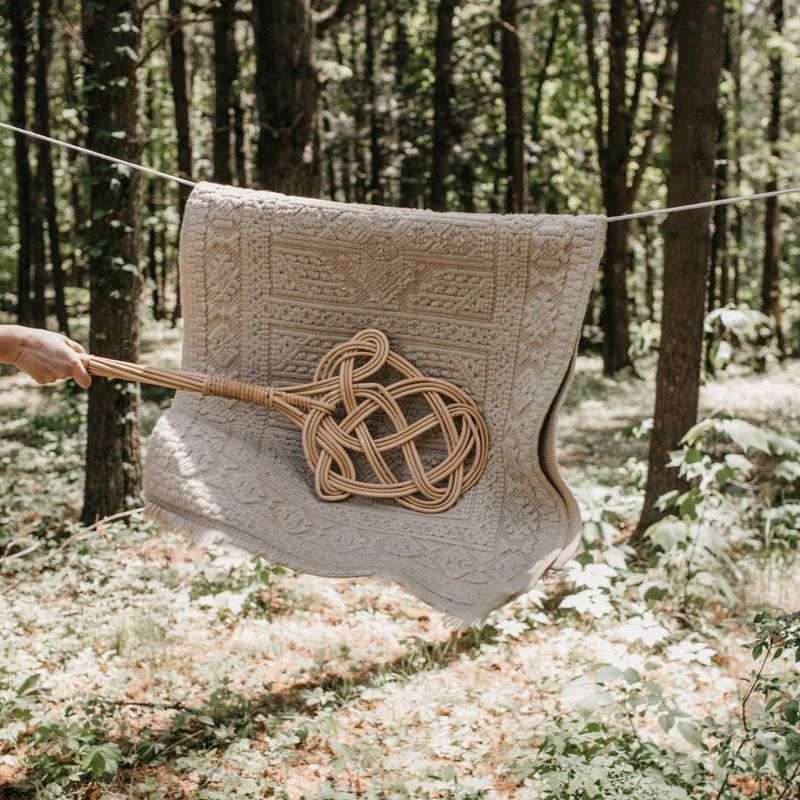 Beating Rugs Outside with a Rug Beater