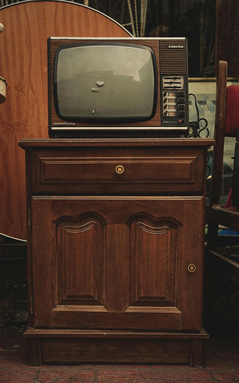 Cleaning Between the Console TV Buttons