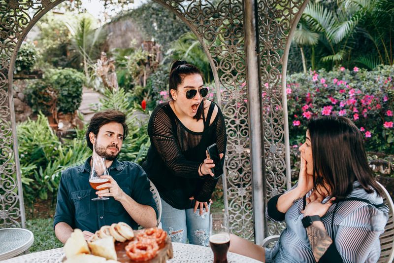 Compete With or Impress Her Social Circle