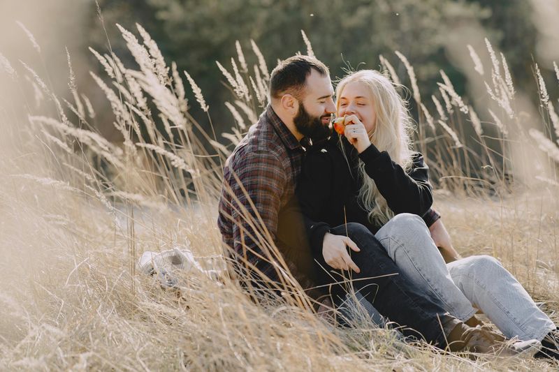 He gets extra flirty when you mention someone else