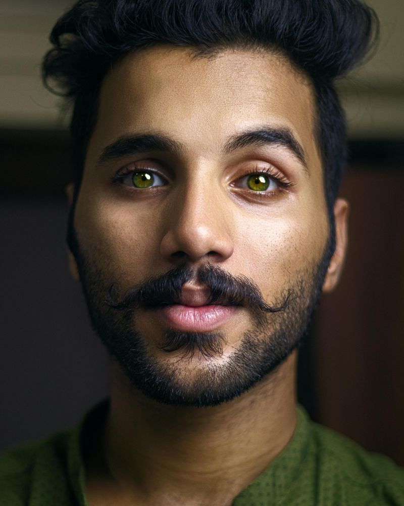 He Raises His Eyebrows Slightly When He Sees You