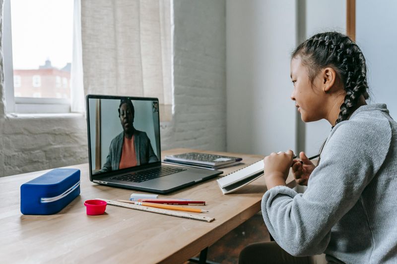 Knowledge Sharing through Online Tutoring