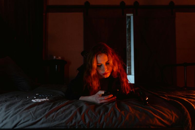 She spends more time on her phone or in another room