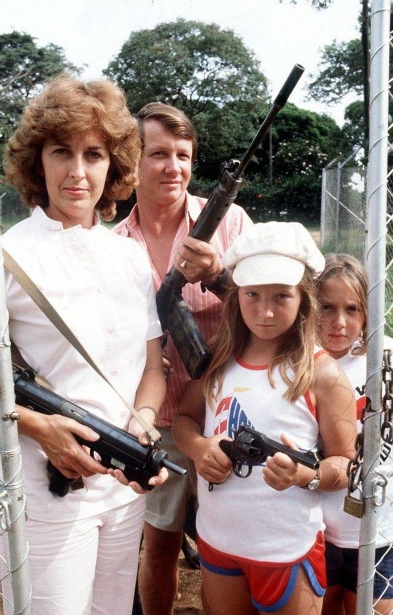Family Photos with Fur Coats and Guns